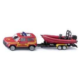 Land Rover Defender mit Boot