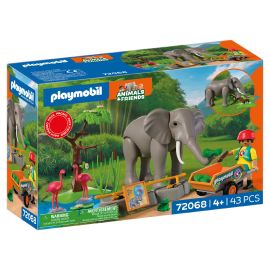 Elefant mit Tierpfleger