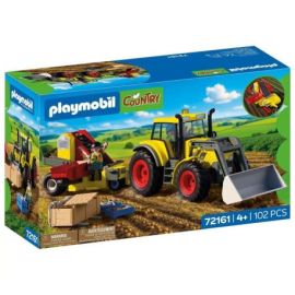 Großer Traktor mit Kartoffelroder