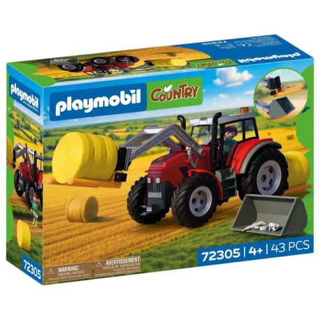 Großer Traktor mit Heuballen