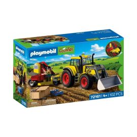 Großer Traktor mit Kartoffelroder