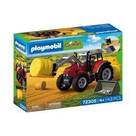 Großer Traktor mit Heuballen